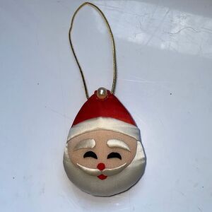 Unique vintage red/white satin Santa Claus face ornament with sewing kit inside
